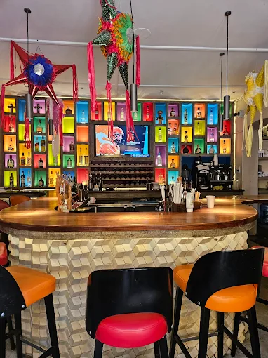 Colorful interior and rooftop terrace of El Pegaso restaurant in San Miguel de Allende
