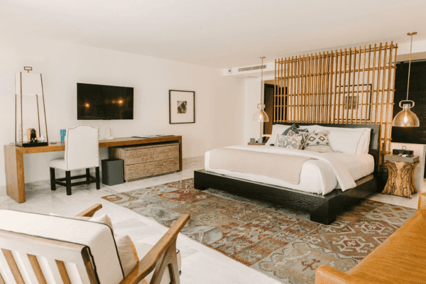 Luxury Suite with contemporary art, spacious layout, and bathtub