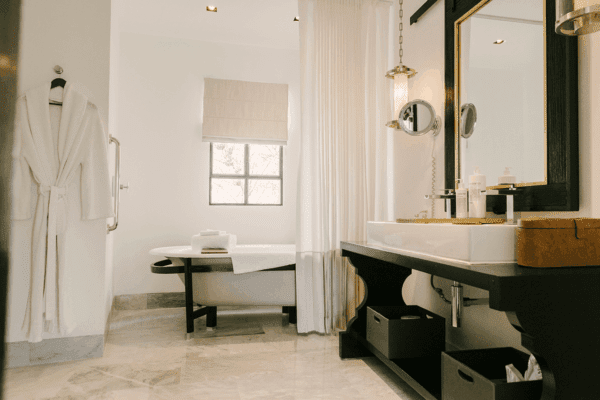 Luxury Suite with contemporary art, spacious layout, and bathtub