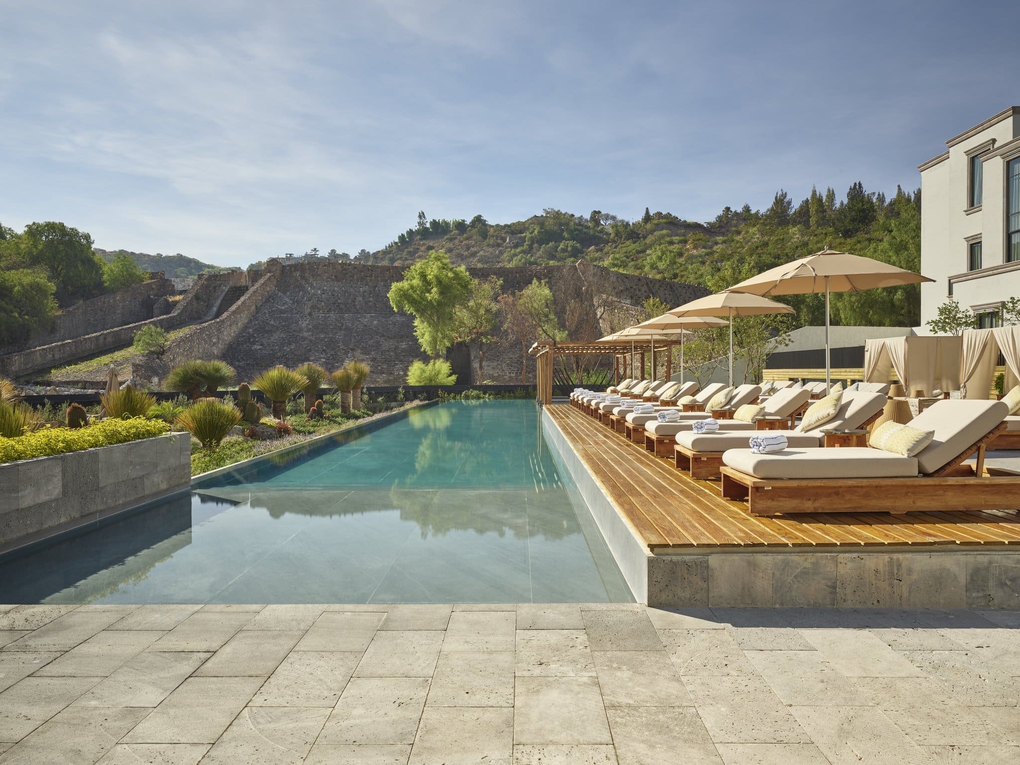 Luxury hotel exterior of Live Aqua San Miguel at sunset